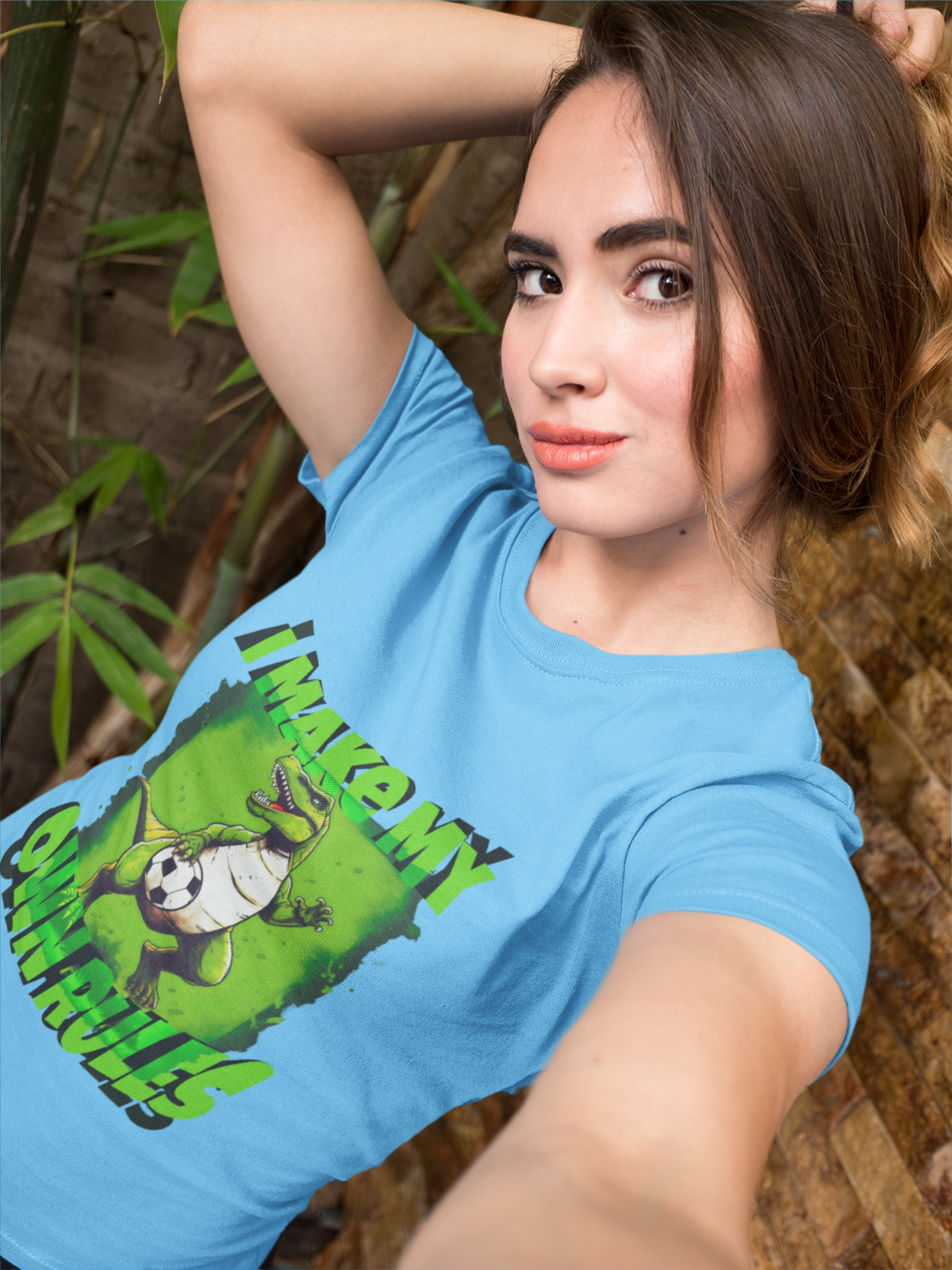 Blue Tee Shirt: Looking to show off your inner rebel on and off the soccer field? Look no further than this T-Rex soccer design tee! The realistic T-Rex design and bold lettering proclaiming "I make my own rules" is the perfect way to showcase your individuality and independence